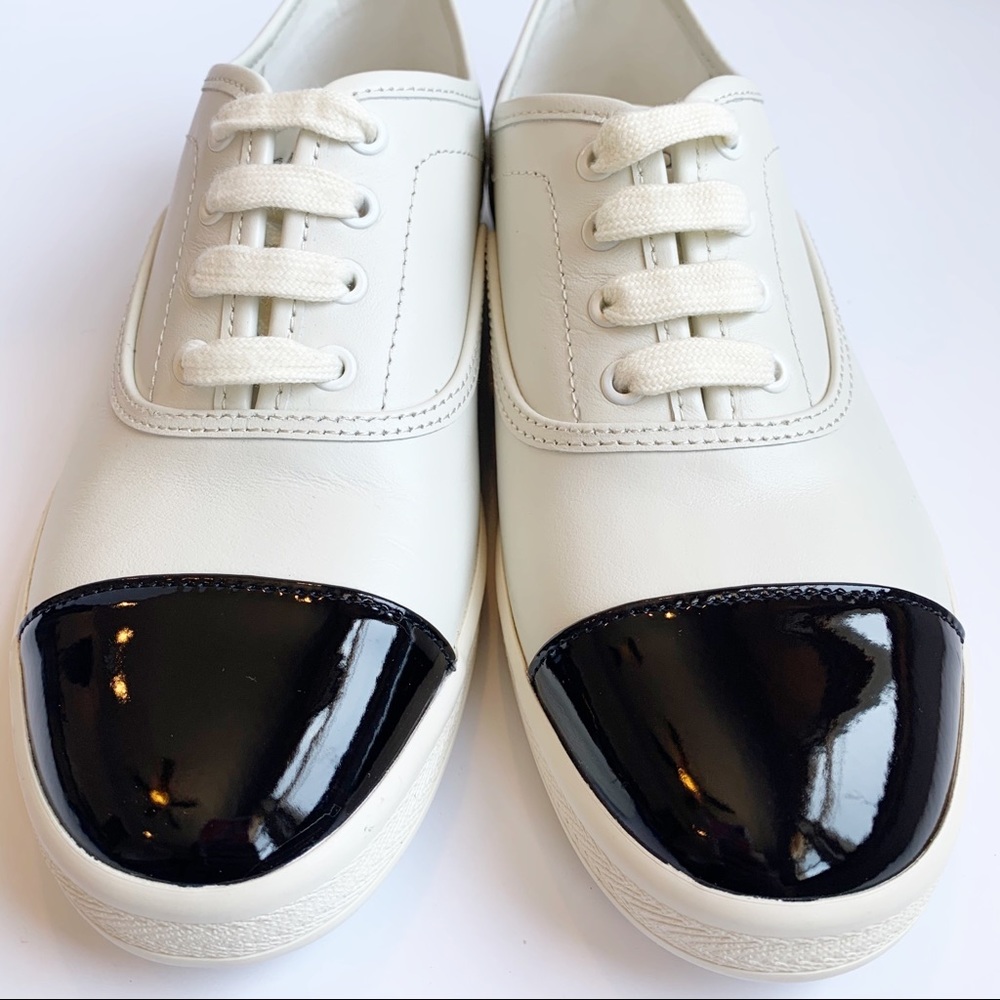 Bandolino off-white Flosie sneaker.    Size 8W